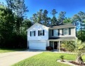 FULLY FURNISHED  *like-new* immaculate 4 bedroom, 2 1/2 baths for sale in Loris South Carolina Horry County County on GolfHomes.com