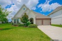 Nestled on the scenic fairways of The Island golf community for sale in Plaquemine Louisiana Iberville Parish County on GolfHomes.com