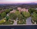 Perched atop a serene Shady Canyon hillside, this three-level for sale in Irvine California Orange County County on GolfHomes.com