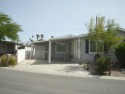 This well-maintained Triple wide manufactured home 3-bedroom 2 for sale in Thousand Palms California Riverside County County on GolfHomes.com