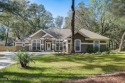 Live the Florida lifestyle in this wonderful pool home on 1/2 for sale in Green Cove Springs Florida Clay County County on GolfHomes.com