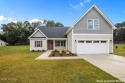 Experience timeless design and modern comfort in the Midland II for sale in Leland North Carolina Brunswick County County on GolfHomes.com