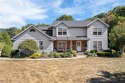 Look no further! This custom-built 5-bedroom, 4-full-bath home for sale in Uniontown Ohio Summit County County on GolfHomes.com