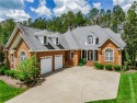 This gorgeous, brick home w/4685 sq. ft. is move-in ready & for sale in Providence Forge Virginia New Kent County County on GolfHomes.com