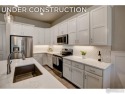 The Barrington by Landmark Homes offers lock & leave for sale in Longmont Colorado Weld County County on GolfHomes.com