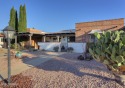 As you enter from the front courtyard of this meticulous 2 for sale in Green Valley Arizona Pima County County on GolfHomes.com