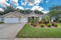 Welcome to this executive style 4 Bedroom, 3 Bath, 3 Car Garage for sale in Tarpon Springs Florida Pinellas County County on GolfHomes.com