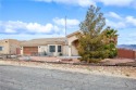 Welcome to 9477 N Singletree Dr. This charming comfortable home for sale in Kingman Arizona Mohave County County on GolfHomes.com