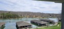 TOP FLOOR RIGHT END UNIT offers fabulous unobstructed water for sale in Huddleston Virginia Bedford County County on GolfHomes.com