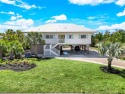 This charming home offers an ideal blend of comfort, style, and for sale in Sanibel Florida Lee County County on GolfHomes.com
