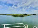 Live aboard boat slip offered in Sombrero Marina is 52' long; for sale in Marathon Florida Monroe County County on GolfHomes.com