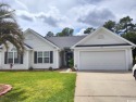 This immaculate, one-level home is located on a large lot for sale in Myrtle Beach South Carolina Horry County County on GolfHomes.com