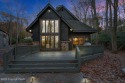 A  4 season chalet  with a modern flair.-Offers  3 bedrooms + for sale in Lake Harmony Pennsylvania Carbon County County on GolfHomes.com