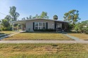 Welcome to 3197 Normandy Drive - a charming, Fully Furnished for sale in Port Charlotte Florida Charlotte County County on GolfHomes.com