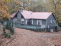 Beautiful chalet style home with Personality plus nestled on two for sale in Holly Lake Ranch Texas Wood County County on GolfHomes.com