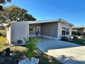 WOW!! The Golf Course and the Water! This is awesome Home in the for sale in Leesburg Florida Lake County County on GolfHomes.com