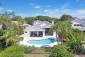 Discover luxury living in this completely renovated gem nestled for sale in Palm Beach Gardens Florida Palm Beach County County on GolfHomes.com