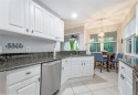 Gorgeous 3 bedroom, 2 bath, furnished, end unit with a large for sale in Naples Florida Collier County County on GolfHomes.com