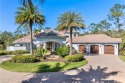 Tucked into the Pines and Oak trees this custom built estate for sale in Naples Florida Collier County County on GolfHomes.com