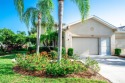 BEAUTIFUL POND VIEW!!! Welcome to  your private oasis nestled in for sale in Sun City Center Florida Hillsborough County County on GolfHomes.com