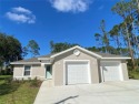 Beautiful Duplex with Freshwater Canal View. Located in Cypress for sale in Palm Coast Florida Flagler County County on GolfHomes.com
