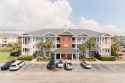 Welcome to your coastal haven at 1107 Louise Costin Way #1212, a for sale in Murrells Inlet South Carolina Horry County County on GolfHomes.com