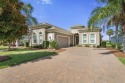 WATERFRONT RETREAT ON RIVERWALK! Welcome to your serene for sale in Palm Coast Florida Flagler County County on GolfHomes.com