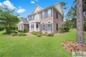 Beautiful 2-story brick home w/Hardi-Plank accents sits on a for sale in Pooler Georgia Chatham County County on GolfHomes.com