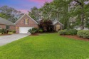 Welcome to your own slice of paradise in the prestigious gated for sale in Myrtle Beach South Carolina Horry County County on GolfHomes.com