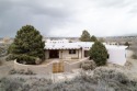 If you've been looking for a quintessential Taos home, this is for sale in Ranchos de Taos New Mexico Taos County County on GolfHomes.com