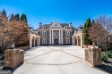 Welcome to elevated living in one of the most prestigious gated for sale in Alpharetta Georgia Fulton County County on GolfHomes.com