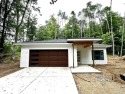 Welcome home to this brand new Andrew Ulberg Builders ranch in for sale in Stanwood Michigan Mecosta County County on GolfHomes.com