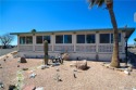 Discover the epitome of resort-style living in this expansive for sale in Bullhead City Arizona Mohave County County on GolfHomes.com