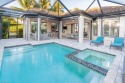 Spectacular former Farnese model home loaded with options for sale in Naples Florida Collier County County on GolfHomes.com