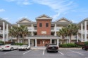 Beautiful second floor condo boasting an open floor plan. Don't for sale in Garden City Beach South Carolina Horry County County on GolfHomes.com