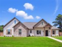 THIS GORGEOUS ONE-OWNER FAMILY HOME SITTING ON A HALF-ACRE LOT for sale in Bullard Texas Cherokee County County on GolfHomes.com