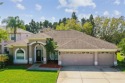 $5000 SELLER CREDIT AVAILABLE. 4/3/3 POOL HOME with LARGE BONUS for sale in Lutz Florida Hillsborough County County on GolfHomes.com