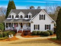 Welcome home to this charming Southern Living style home tucked for sale in Monroe Georgia Walton County County on GolfHomes.com