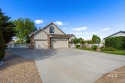 Charming 4-bedroom, 3-bathroom home nestled within the lush for sale in Caldwell Idaho Canyon County County on GolfHomes.com