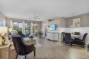 Desirable first floor end unit in the Sabal Palm Community of for sale in Estero Florida Lee County County on GolfHomes.com
