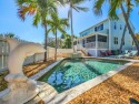 Luxury awaits at this exquisite corner 2-story townhouse in Key for sale in Key West Florida Monroe County County on GolfHomes.com