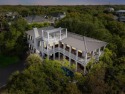 Live at the Beach in this custom built beach house by esteemed for sale in Isle of Palms South Carolina Charleston County County on GolfHomes.com