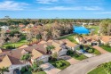 This 3 bedroom/2 bath attached villa offers a warm welcome with for sale in Bonita Springs Florida Lee County County on GolfHomes.com