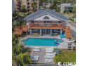 Experience coastal living in this direct Oceanfront 7 bedroom, 5 for sale in North Myrtle Beach South Carolina Horry County County on GolfHomes.com