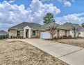 Looking for a a beautiful open plan 3/2 home with great curb for sale in Brandon Mississippi Rankin County County on GolfHomes.com