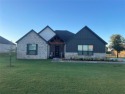 Enjoy peaceful country living along with wonderful amenities for sale in Blanchard Oklahoma Grady County County on GolfHomes.com