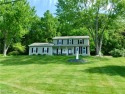 Life really is better at the lake! Relax on your covered front for sale in Malvern Ohio Carroll County County on GolfHomes.com