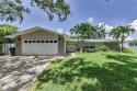 Welcome to this stunning renovated 4-bedroom, 3-bathroom pool for sale in Dunedin Florida Pinellas County County on GolfHomes.com