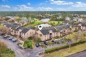 Enjoy an open floor plan END UNIT condo with vaulted high for sale in St Augustine Florida Saint Johns County County on GolfHomes.com