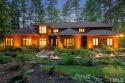 Stunning lakefront contemporary nestled in the trees with views for sale in Durham North Carolina Durham County County on GolfHomes.com